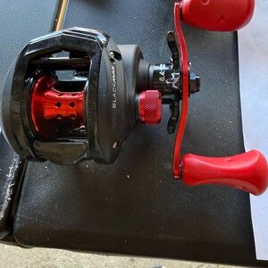 BlackMax Red and Black Fishing Reel